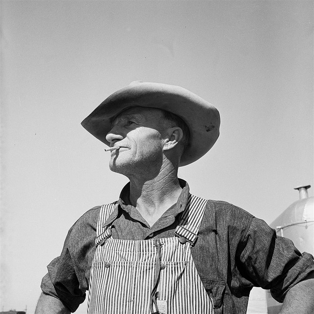 Man in overalls and hat